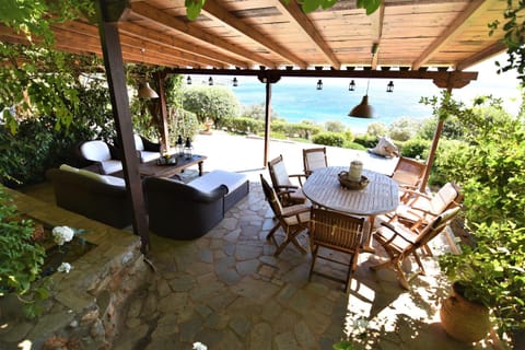 Patio, Lounge or bar, Seating area, Dining area, Garden view, Sea view