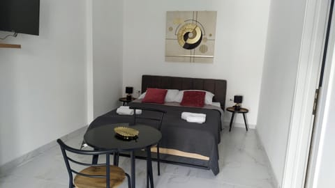 Bed, Seating area, Dining area, Bedroom