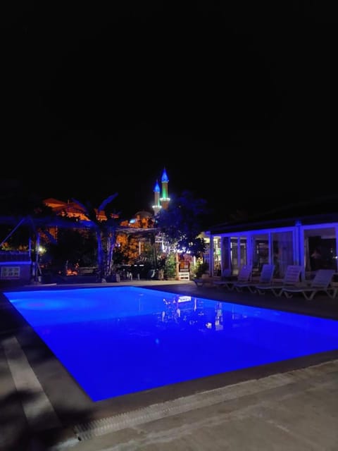 Property building, Night, Pool view, Swimming pool