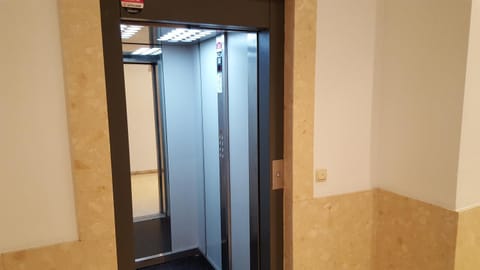 Property building, elevator