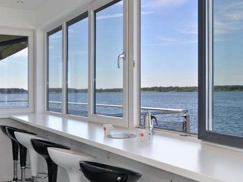 Waterfront penthouse with roof terrace and private jetty Condo in Kamperland