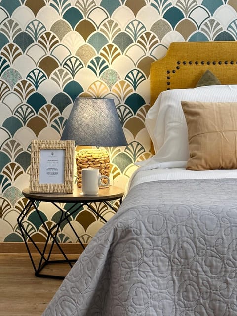 Bed, Living room, Seating area, Bedroom