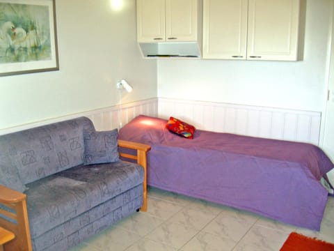 Bed, Living room, Seating area