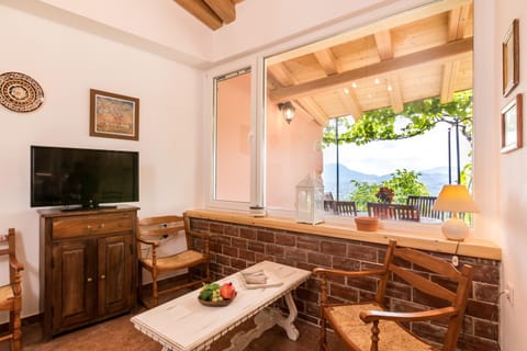 Living room, Seating area, City view, Garden view, Mountain view