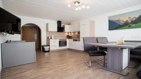 Kitchen or kitchenette, Living room, Seating area, stove