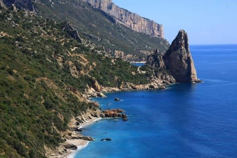 Nearby landmark, Day, Natural landscape, Beach, Mountain view