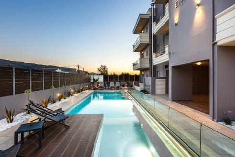 Property building, Swimming pool, Swimming pool, Sunrise, Sunset