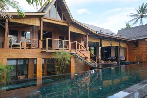 4 bedrooms villa with sea view private pool and furnished garden at Kabupaten de Tabanan Villa in West Selemadeg