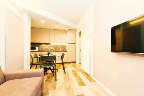 TV and multimedia, Kitchen or kitchenette, Living room, Seating area, Dining area, heating, oven, stove, air conditioner
