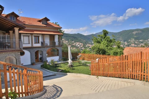 Facade/entrance, City view, Garden view