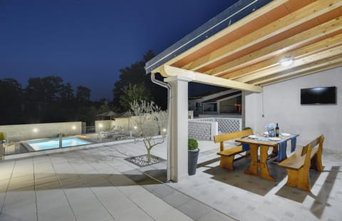 Patio, Night, Balcony/Terrace, Pool view