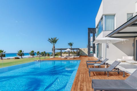 Property building, Patio, Day, Natural landscape, Sea view, Swimming pool, sunbed