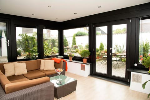 Living room, Seating area, Garden view