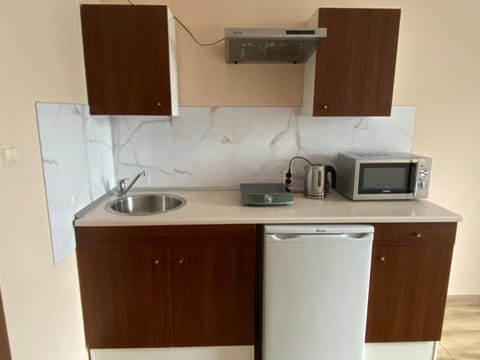 Kitchen or kitchenette, stove