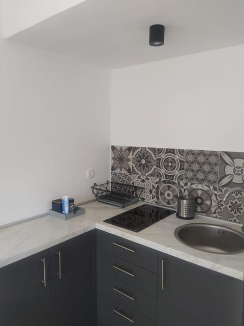 Kitchen or kitchenette, stove