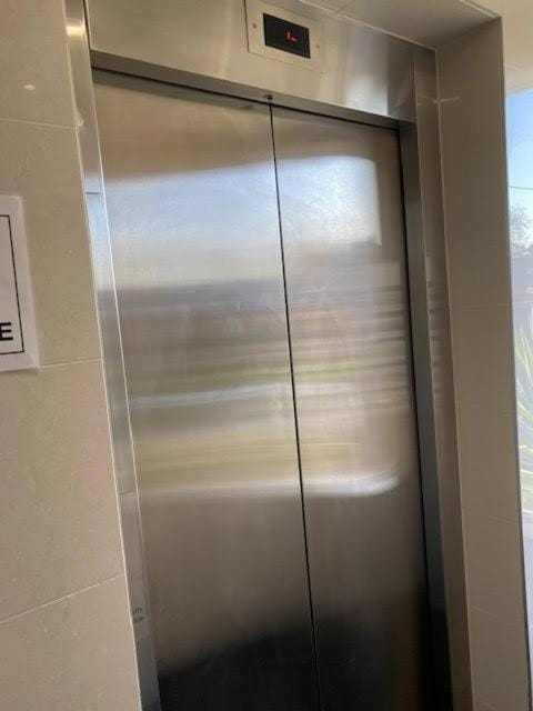 Property building, elevator