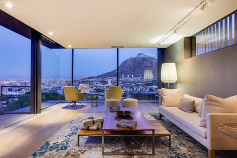 View (from property/room), Balcony/Terrace, Living room, Seating area, City view, Mountain view