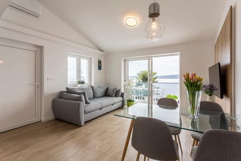 Living room, Seating area, Dining area, Sea view