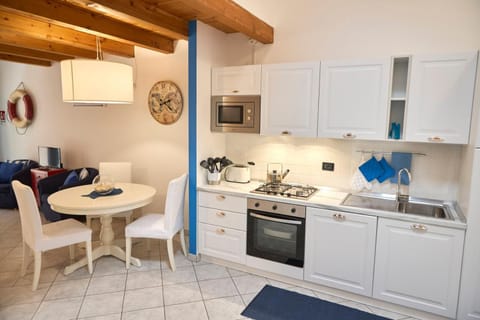 Kitchen or kitchenette, Italian breakfast, dishwasher, microwave, oven, toaster, kitchen