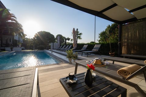 Patio, Pool view, Swimming pool, sunbed