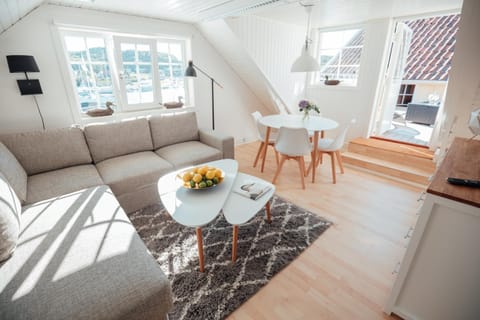 Bed, Living room, Seating area, Sea view