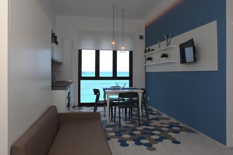 TV and multimedia, Kitchen or kitchenette, Living room, Seating area, Sea view