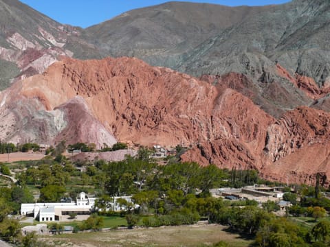 Property building, Nearby landmark, Day, Natural landscape, Mountain view