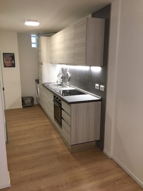 Kitchen or kitchenette, stove, kitchen