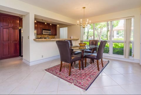 PGA National Resort Golf Villa - Luxurious Two Bedroom First Floor Water View Condo in Palm Beach Gardens
