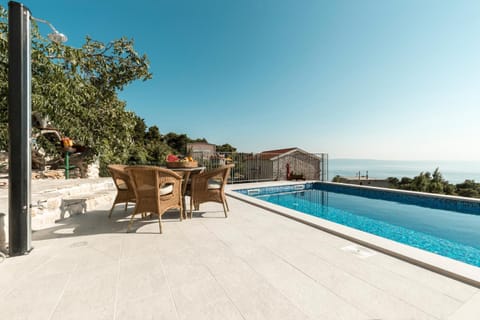 Seating area, Mountain view, Sea view, Swimming pool