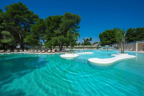 Day, Natural landscape, Beach, Pool view, Swimming pool, sunbed