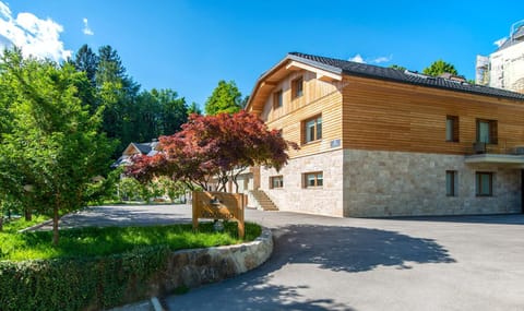 Property building, Facade/entrance, Spring, Day, Garden, Garden view