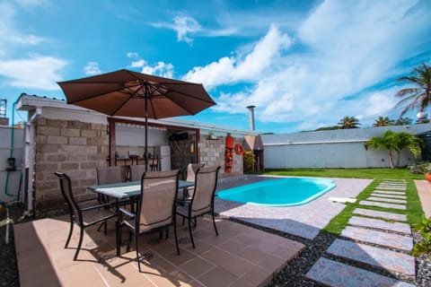 Property building, Patio, BBQ facilities, Pool view, Swimming pool, Swimming pool