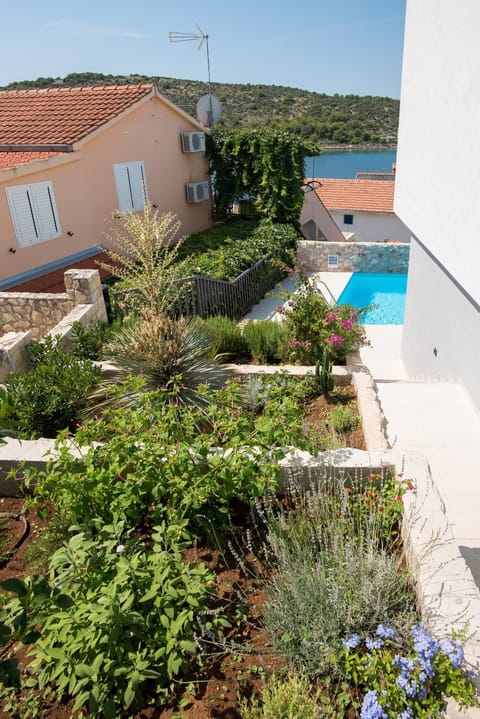 Property building, Garden, Pool view, Swimming pool