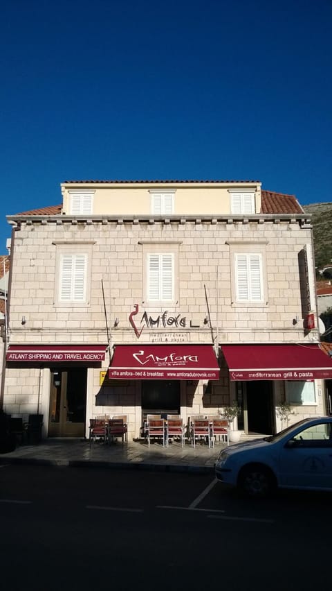 Facade/entrance, View (from property/room), Street view