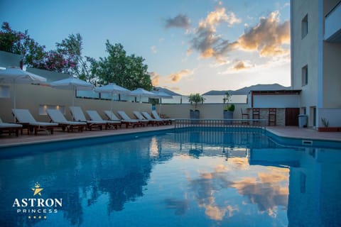 Property building, Swimming pool, Sunset