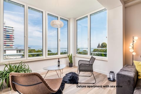 Living room, Seating area, Garden view, Sea view