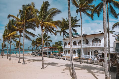 Property building, Nearby landmark, Day, Natural landscape, Beach, Sea view