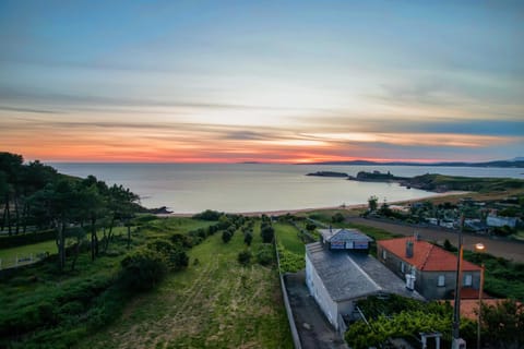 Property building, Nearby landmark, Day, Natural landscape, Sea view, Sunset