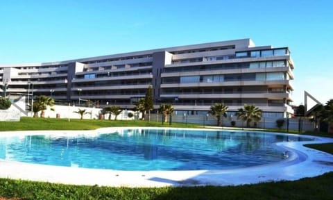 Apartamento Lujo, Primera linea playa, Garaje, Wifi, Piscina climatizada Condo in Roquetas de Mar