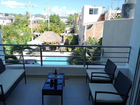 Balcony/Terrace, Seating area, Pool view, Swimming pool