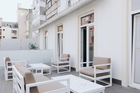 Property building, Patio, Balcony/Terrace, Seating area