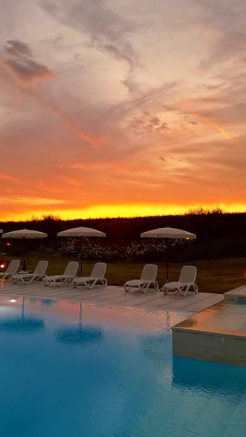 Natural landscape, Pool view, Swimming pool, Sunset, sunbed
