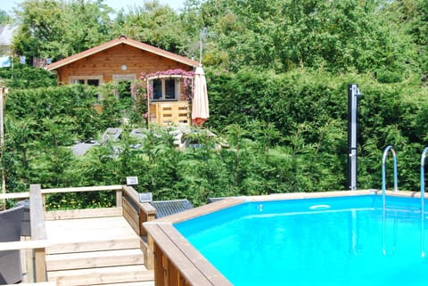 Facade/entrance, People, Bird's eye view, BBQ facilities, Garden, Garden view, Pool view, Swimming pool, Family