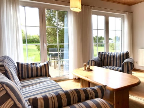 Living room, Seating area, Garden view