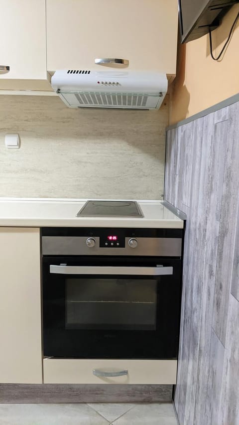 Kitchen or kitchenette, oven, stove