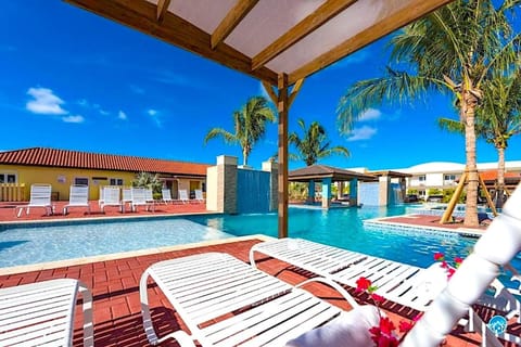 Property building, Patio, Day, Natural landscape, Pool view, Swimming pool, sunbed