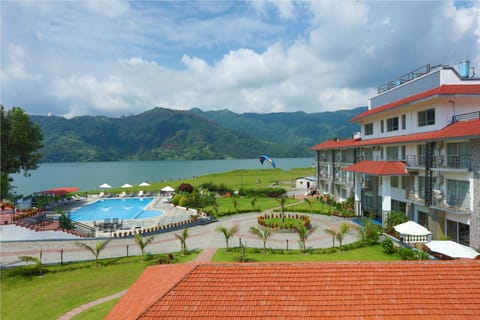 Property building, Facade/entrance, Garden view, Lake view, Pool view