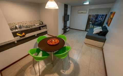 Kitchen or kitchenette, Living room, Seating area, Dining area