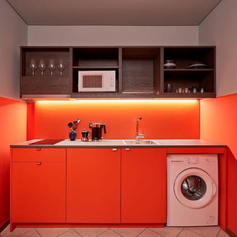 Kitchen or kitchenette, washing machine